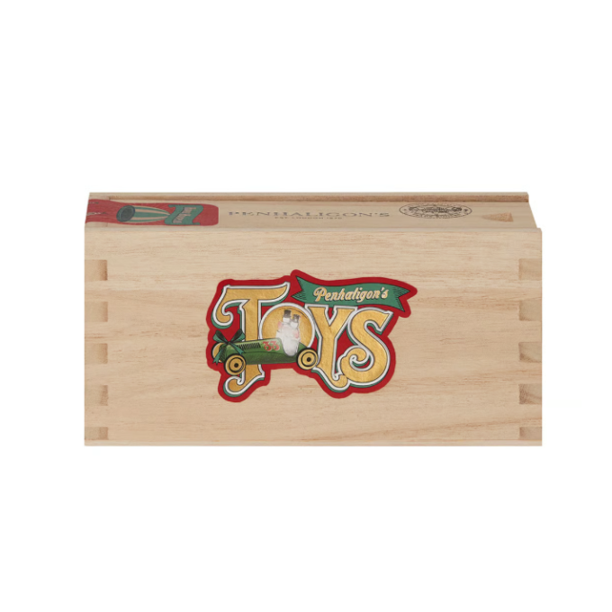 Wooden toy box with 'Penhaligon's Toys' logo on a white background